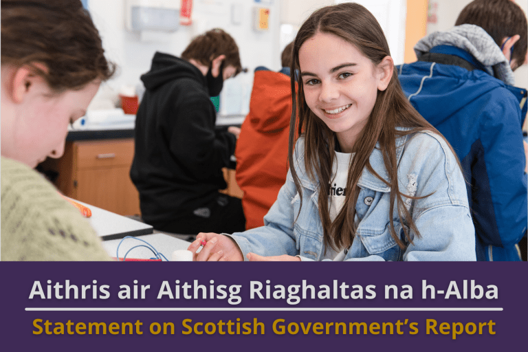 Picture: A girl in a high school class smiling. Text reads 'Statement on Scottish Government's Report'
